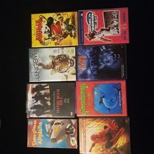 7 used DVD's and one used VHS Spider Man, Rats, Hang Over 1 and 2 and more...